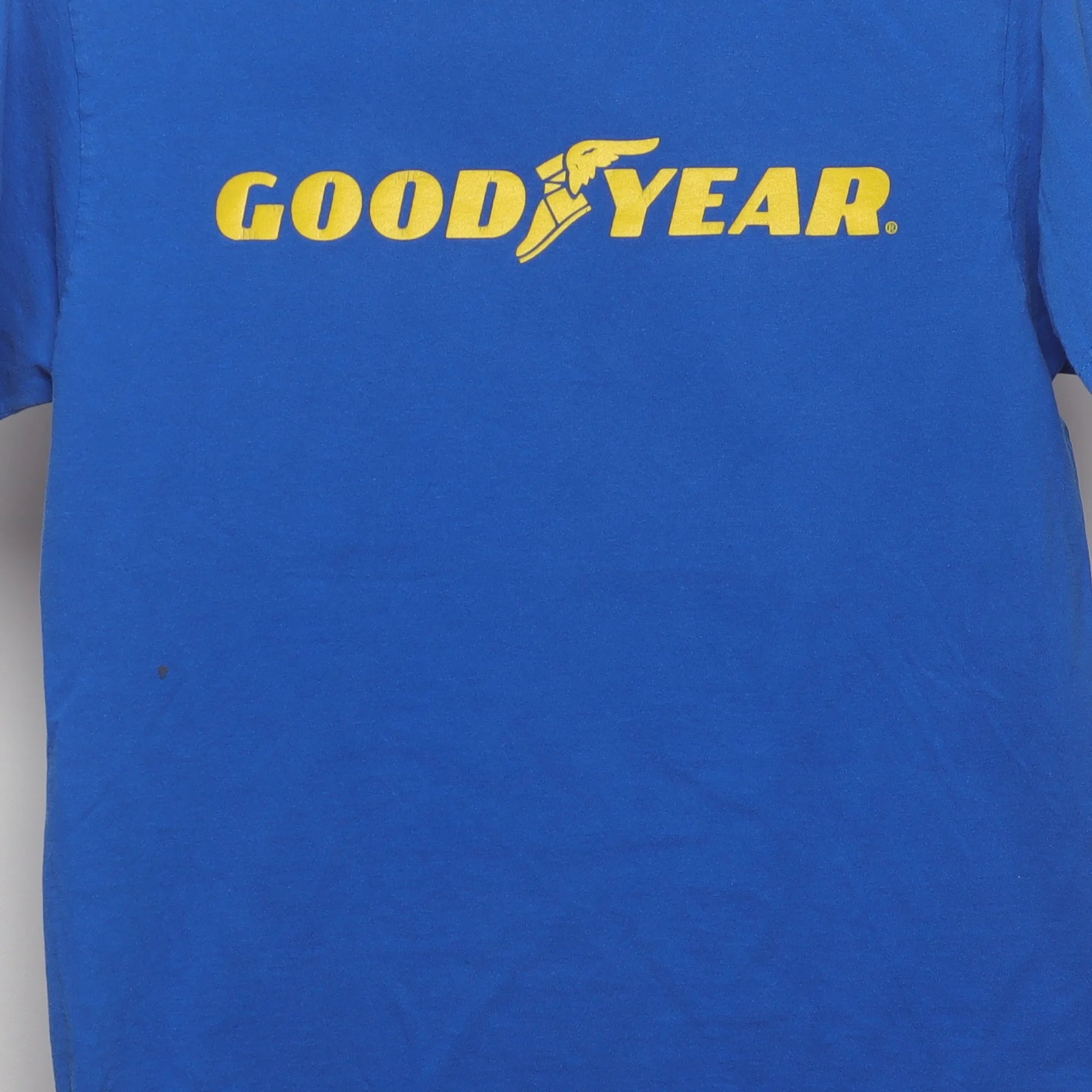 Close-up of the main graphic on the Vintage 90s Goodyear Winged Foot Logo T-Shirt S