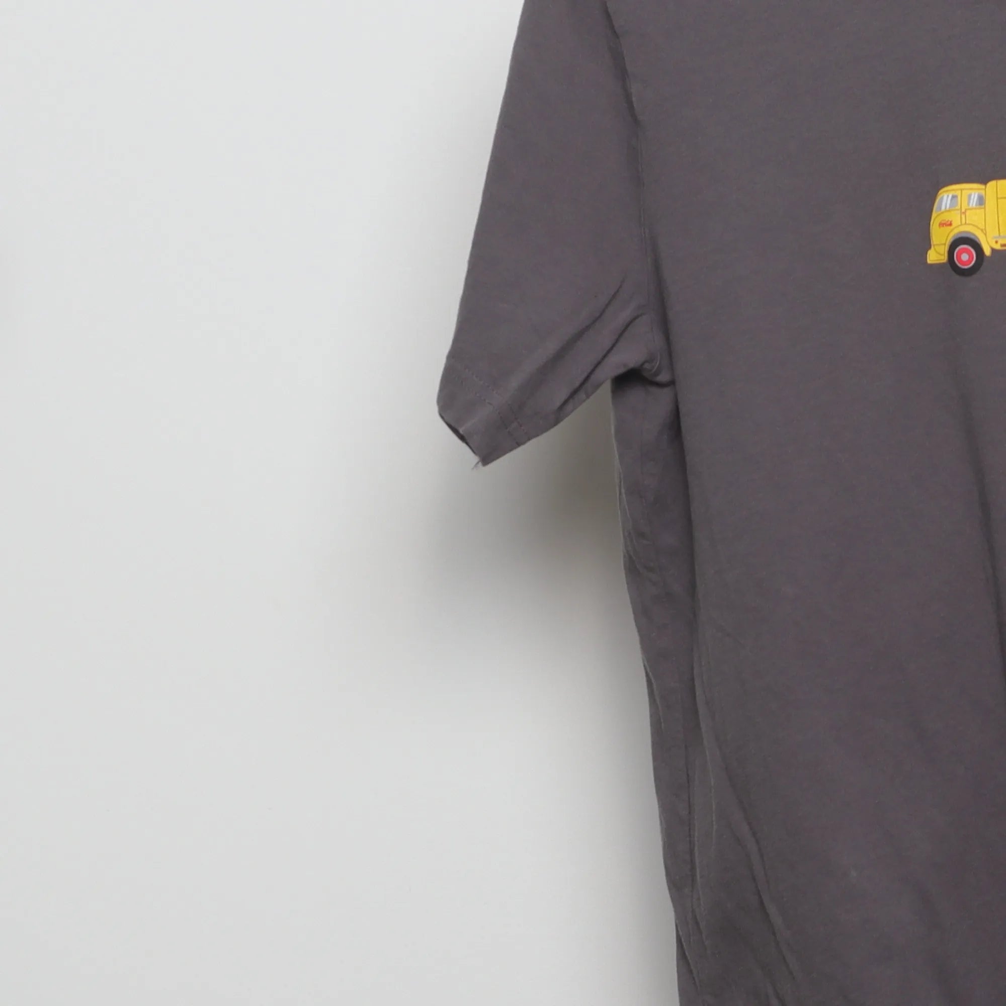 Close-up of the sleeve on the Vintage Coca-Cola Delivery Truck Graphic T-Shirt L