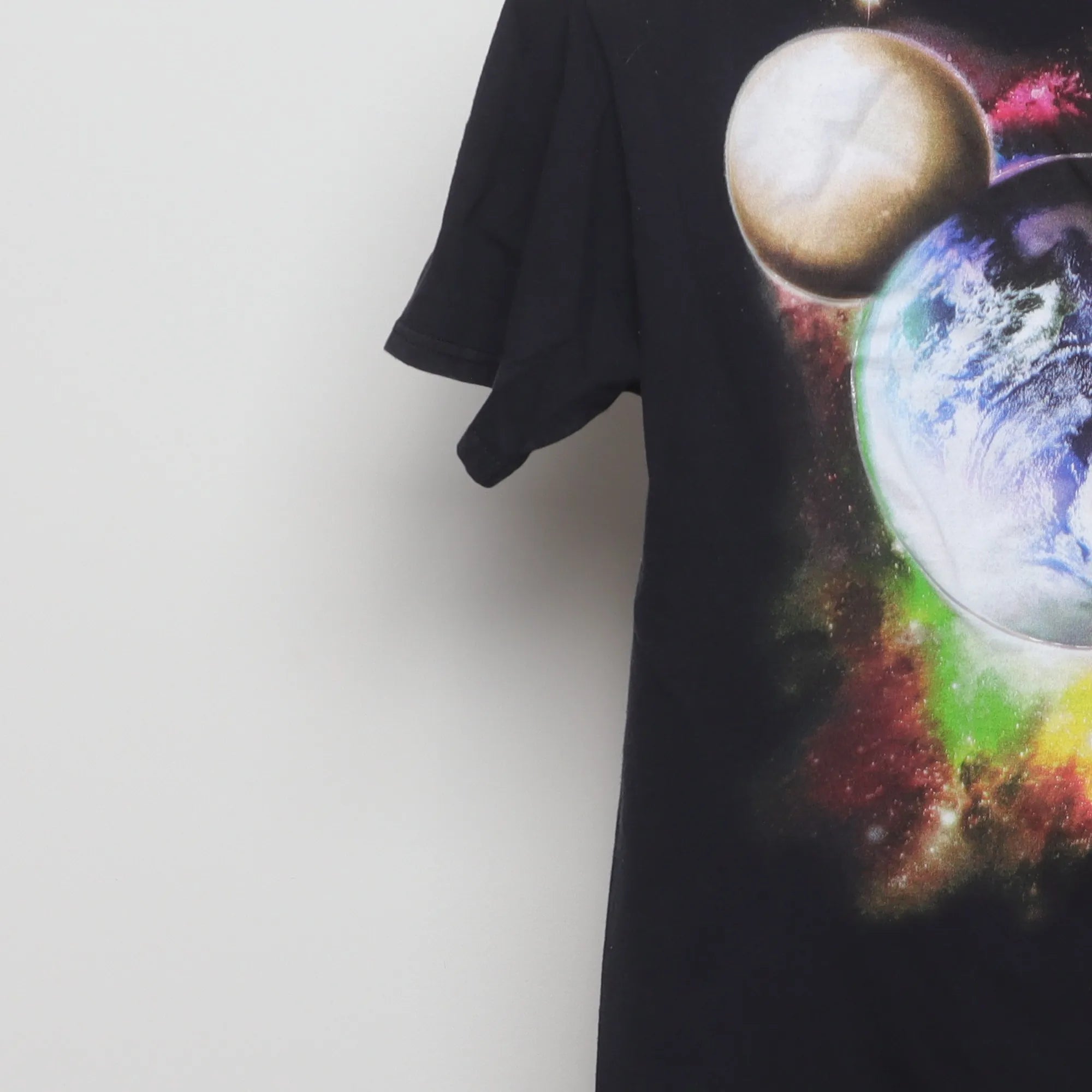 Close-up of the sleeve on the Vintage Disney Parks Cosmic Mickey Graphic T-Shirt S