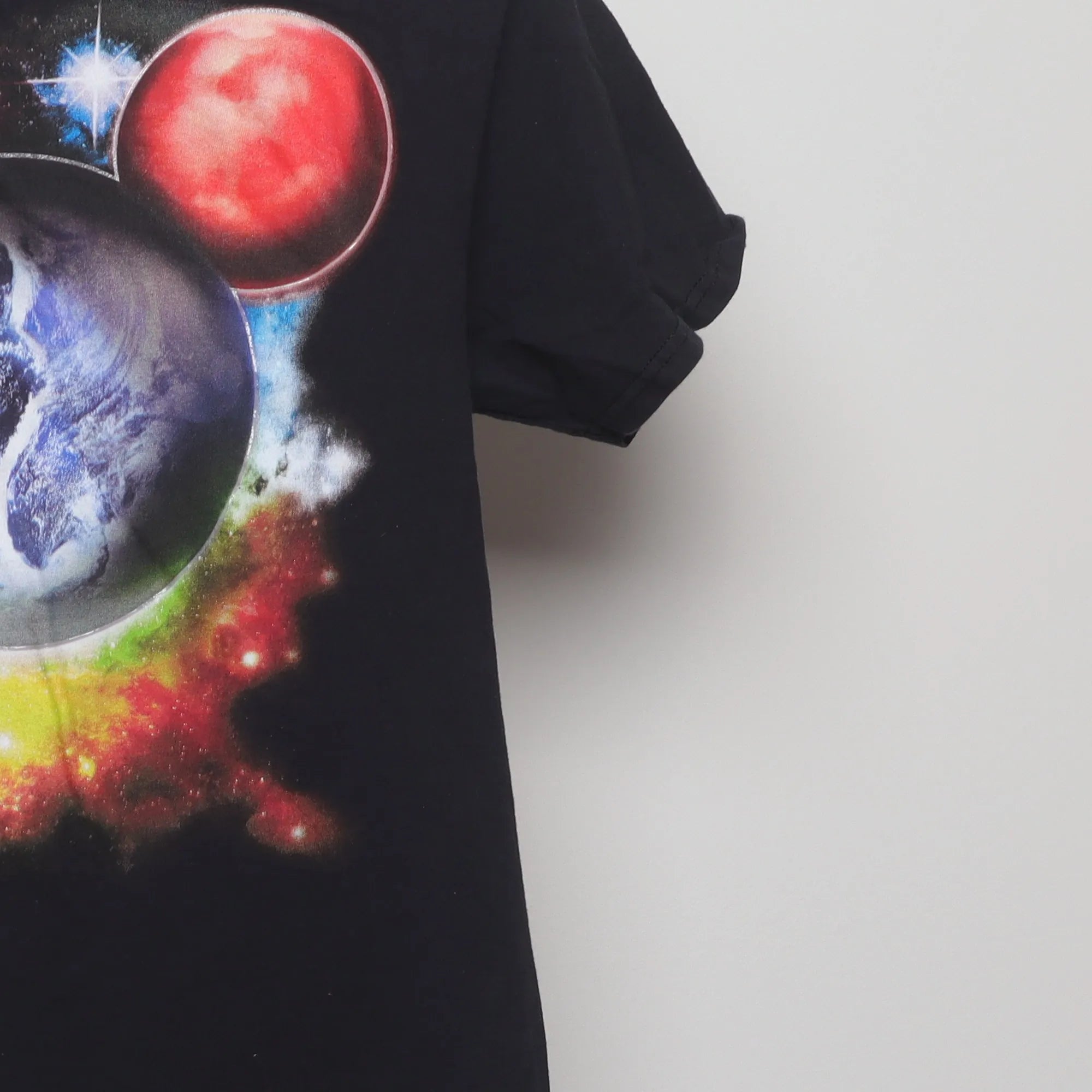 Close-up of the sleeve on the Vintage Disney Parks Cosmic Mickey Graphic T-Shirt S