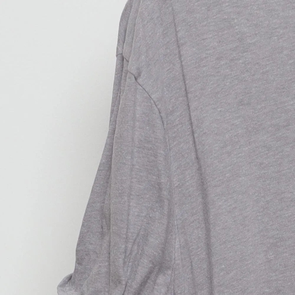 Close-up of the sleeve on the Vintage Modern Elf Movie "Need Hugs" T-Shirt - XXL