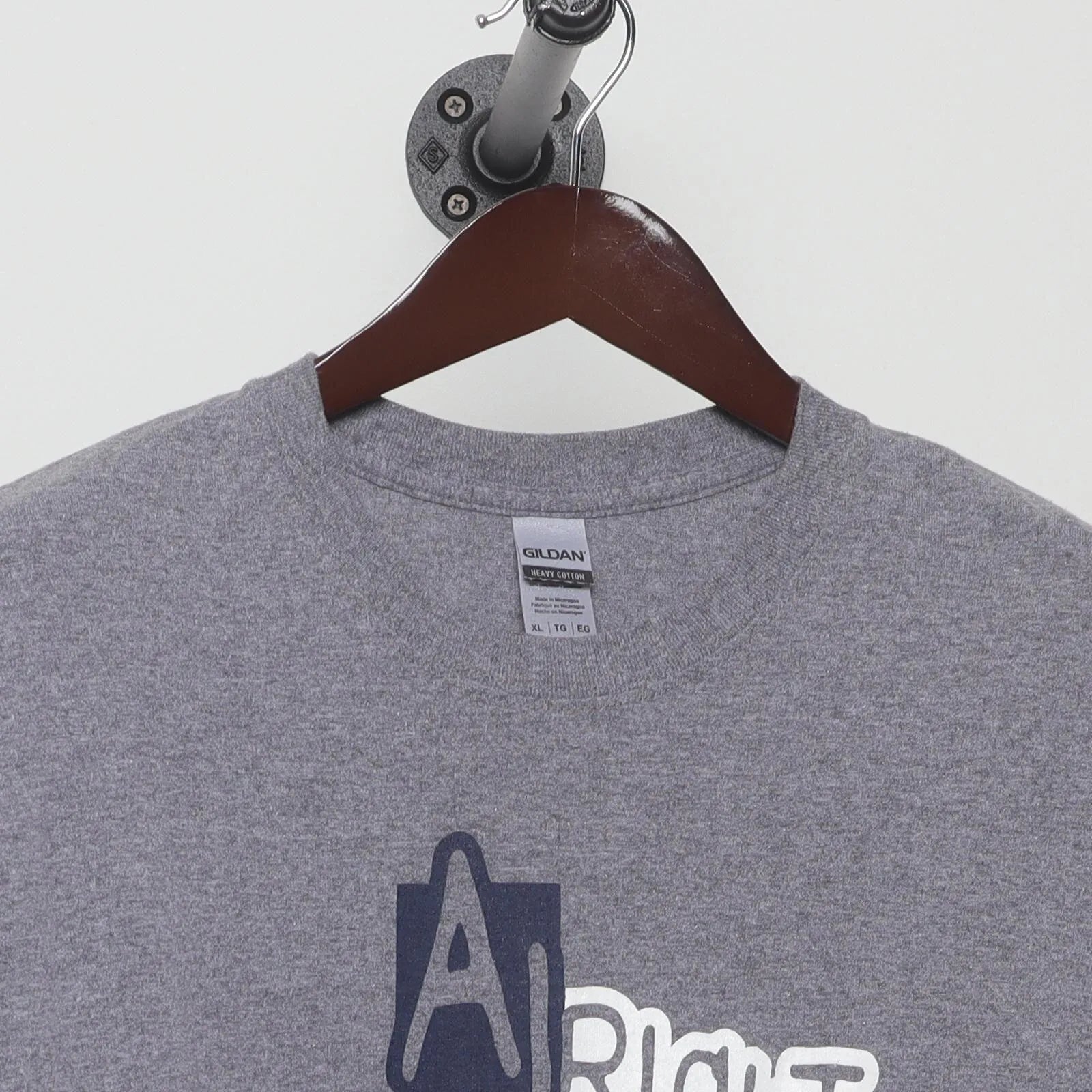 Close-up of the collar and tag on the Vintage Modern Matthew McConaughey "Alright Alright Alright Texas" T-Shirt - L