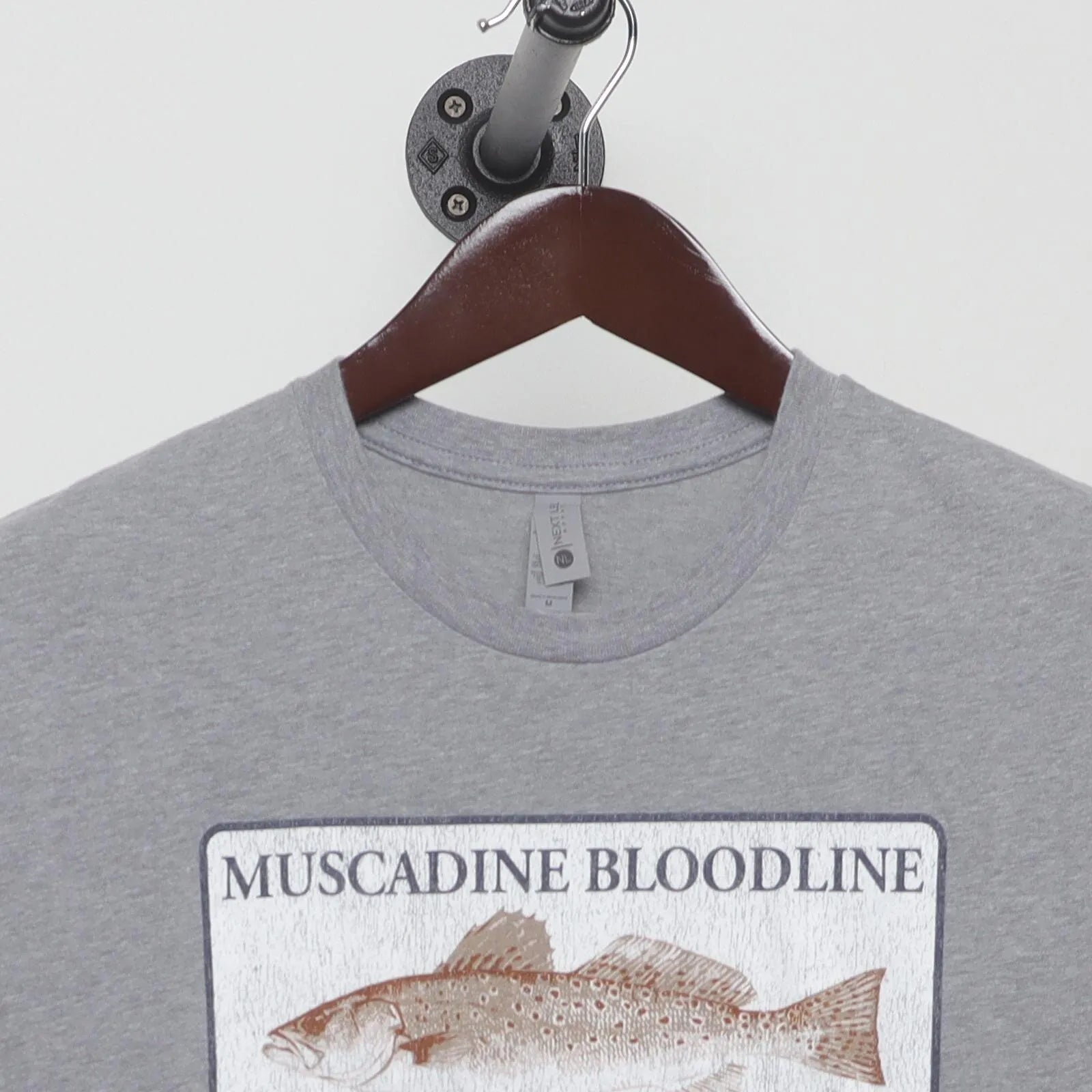 Close-up of the collar and tag on the Vintage Modern Muscadine Bloodline "Redfish" T-Shirt - S