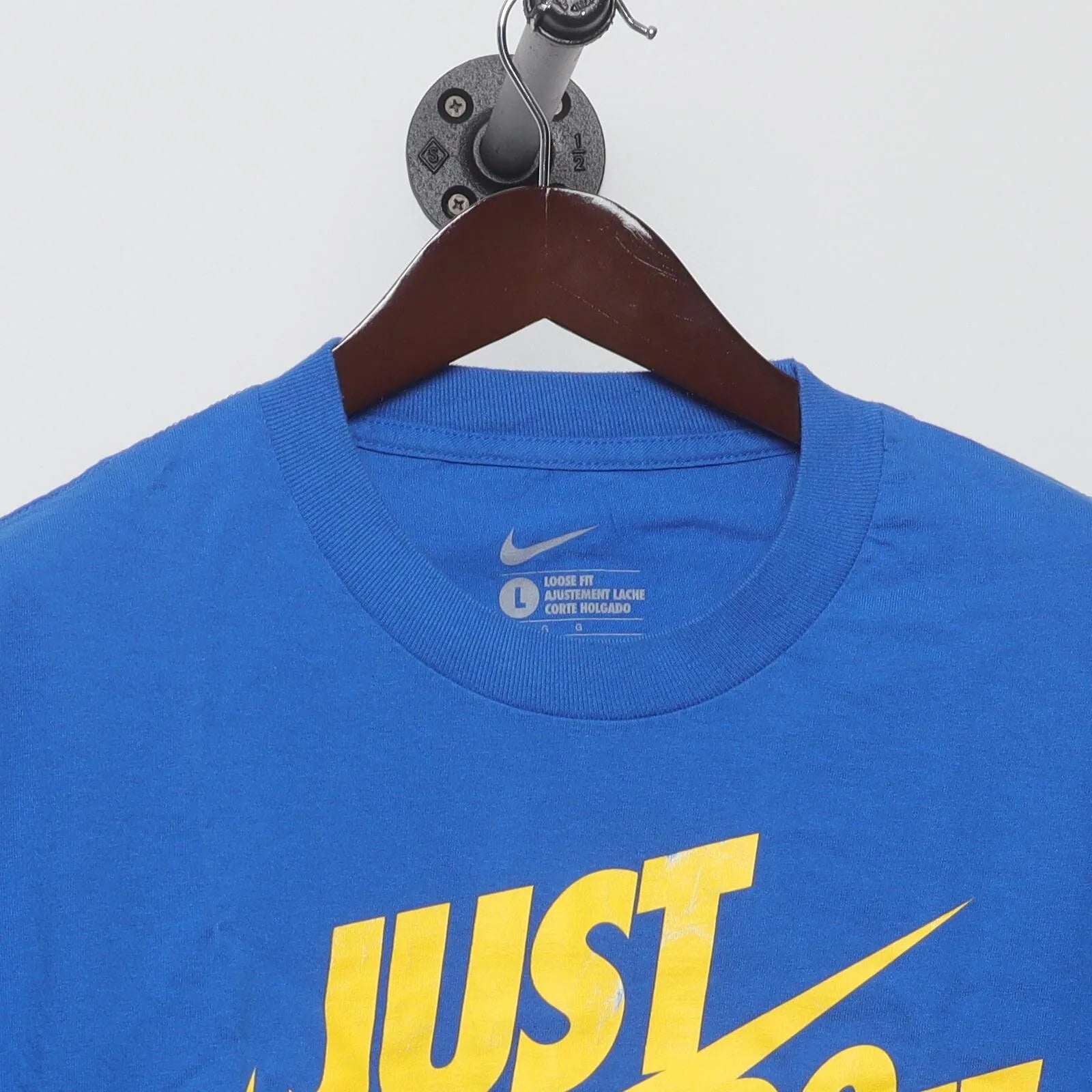Close-up of the collar and tag on the Vintage Modern Nike "Just Do It Swoosh Logo" T-Shirt - M
