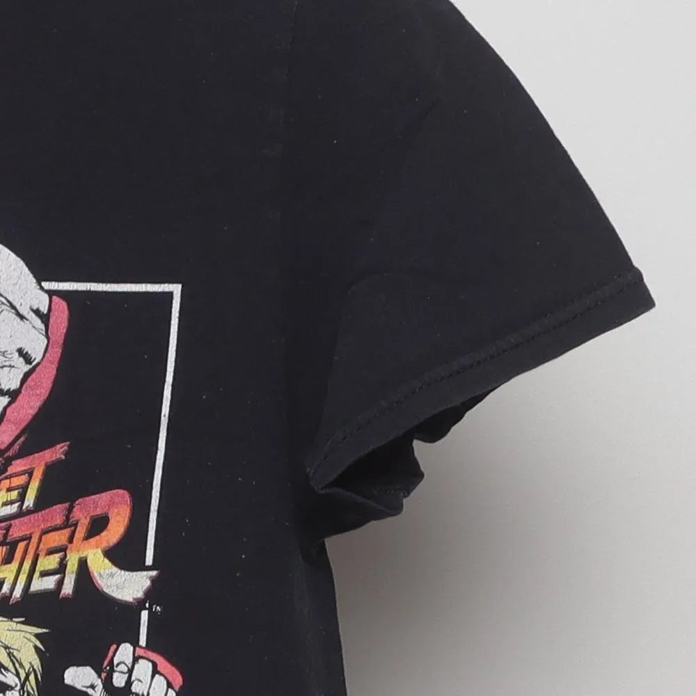 Close-up of the sleeve on the Vintage Modern Street Fighter "Character Stack" T-Shirt - XS