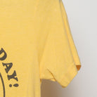 Close-up of the Right sleeve on the Vintage 1970s walk in love. "Have A Nice Day" Smiley Face T-Shirt - XS
