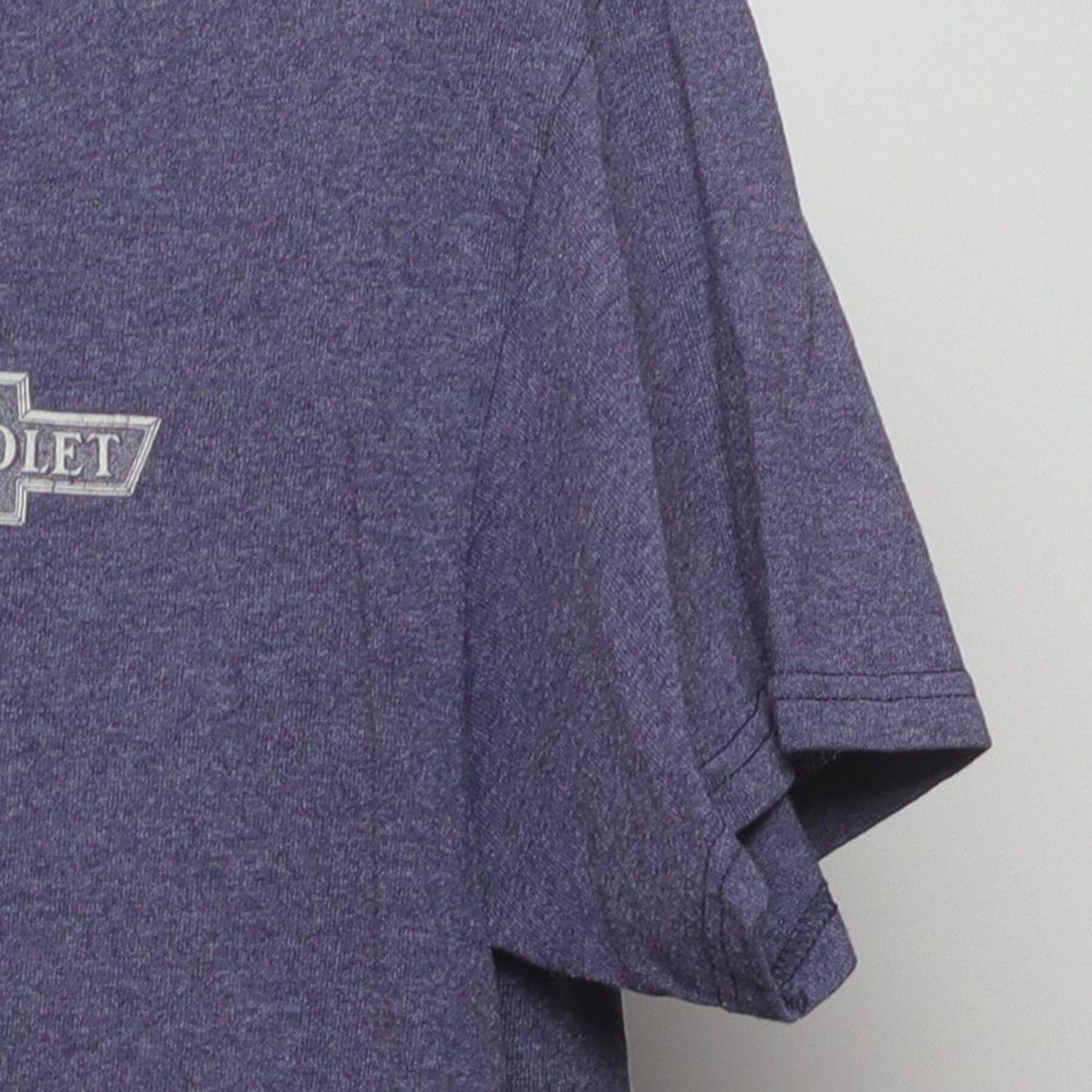 Close-up of the Right sleeve on the Vintage Y2K Chevrolet "American Heritage" T-Shirt - S