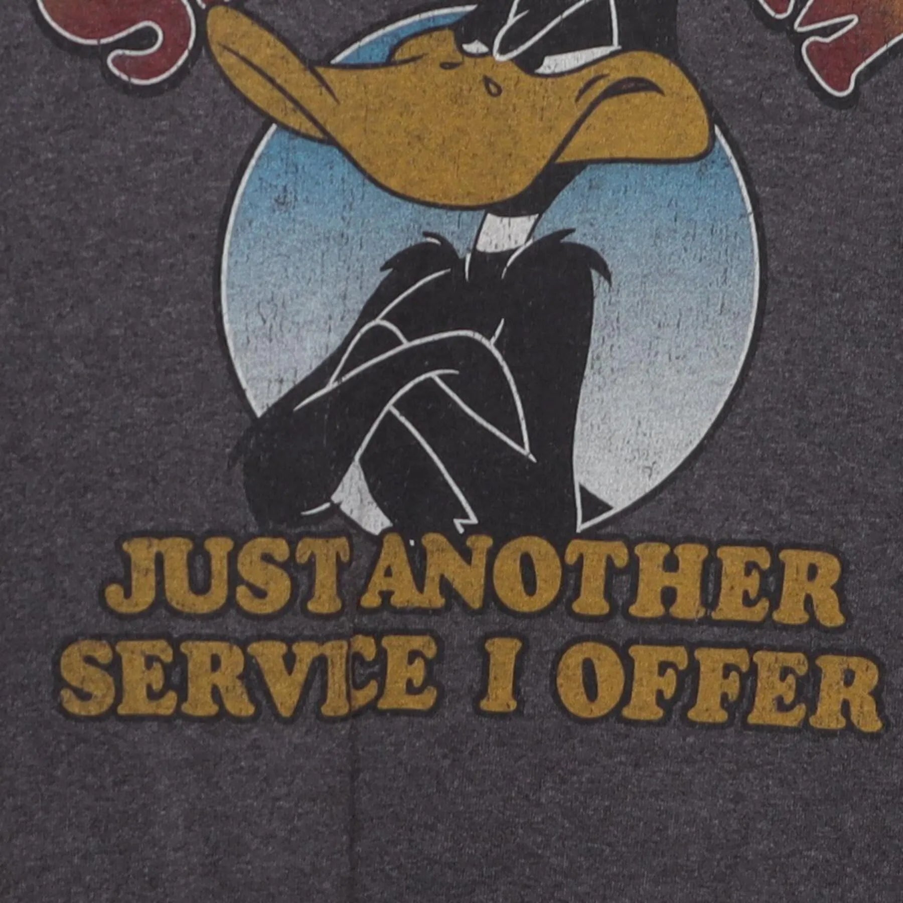 Close-up of the main graphic on the Vintage 1990s Looney Tunes "Sarcasm Service" T-Shirt - S