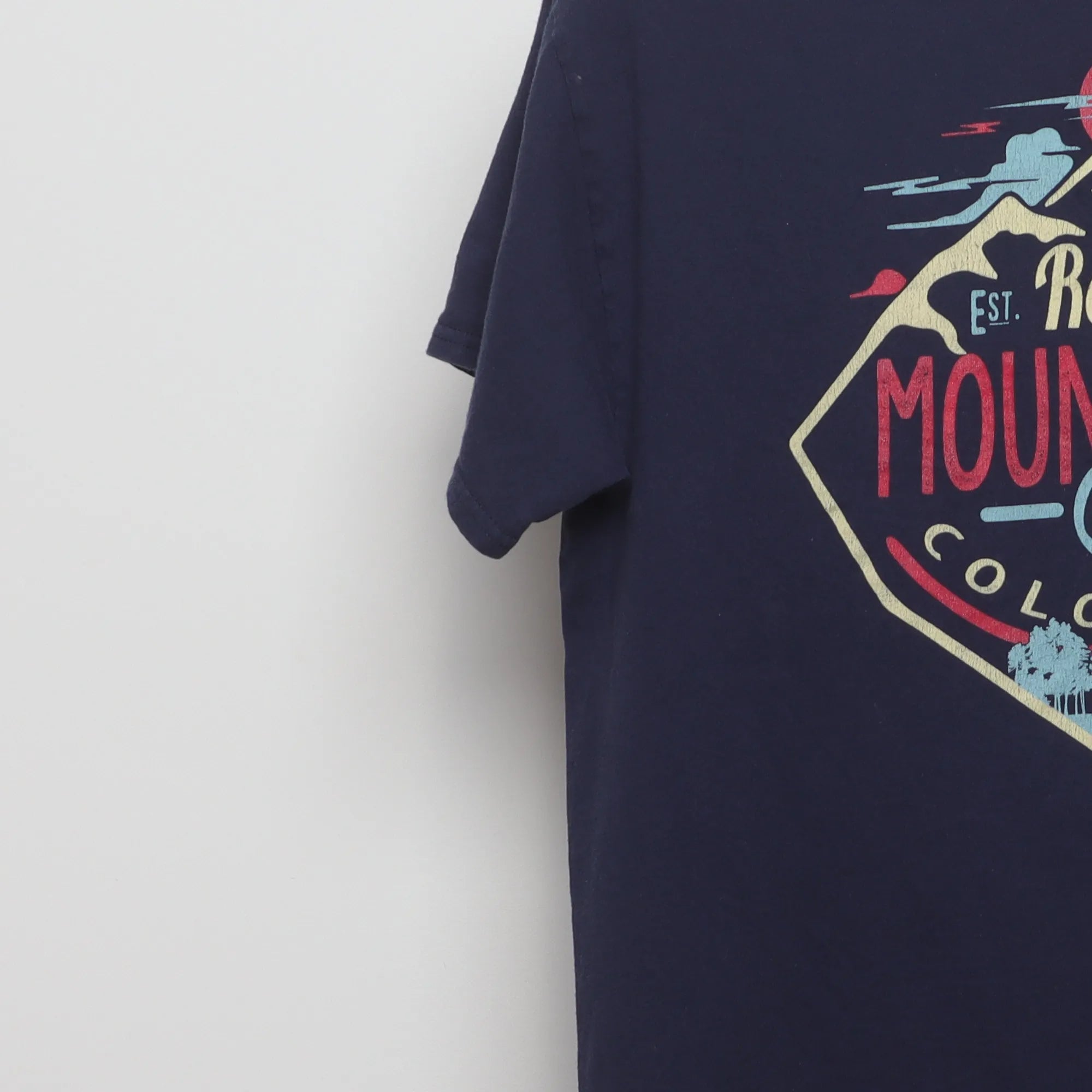 Close-up of the sleeve on the Vintage Style Rocky Mountains Souvenir T-Shirt M