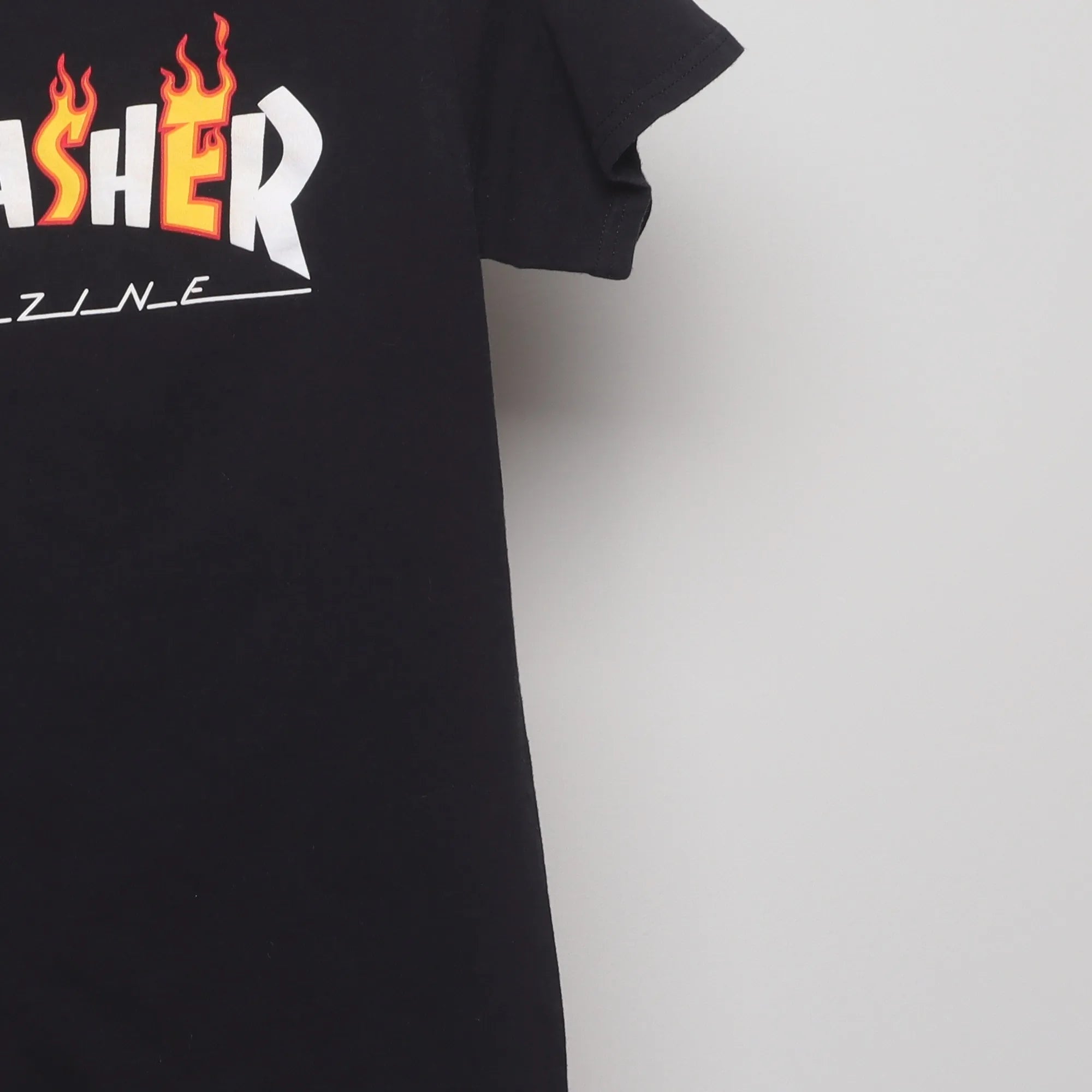 Close-up of the sleeve on the Vintage Thrasher Flame Logo Skate T-Shirt S