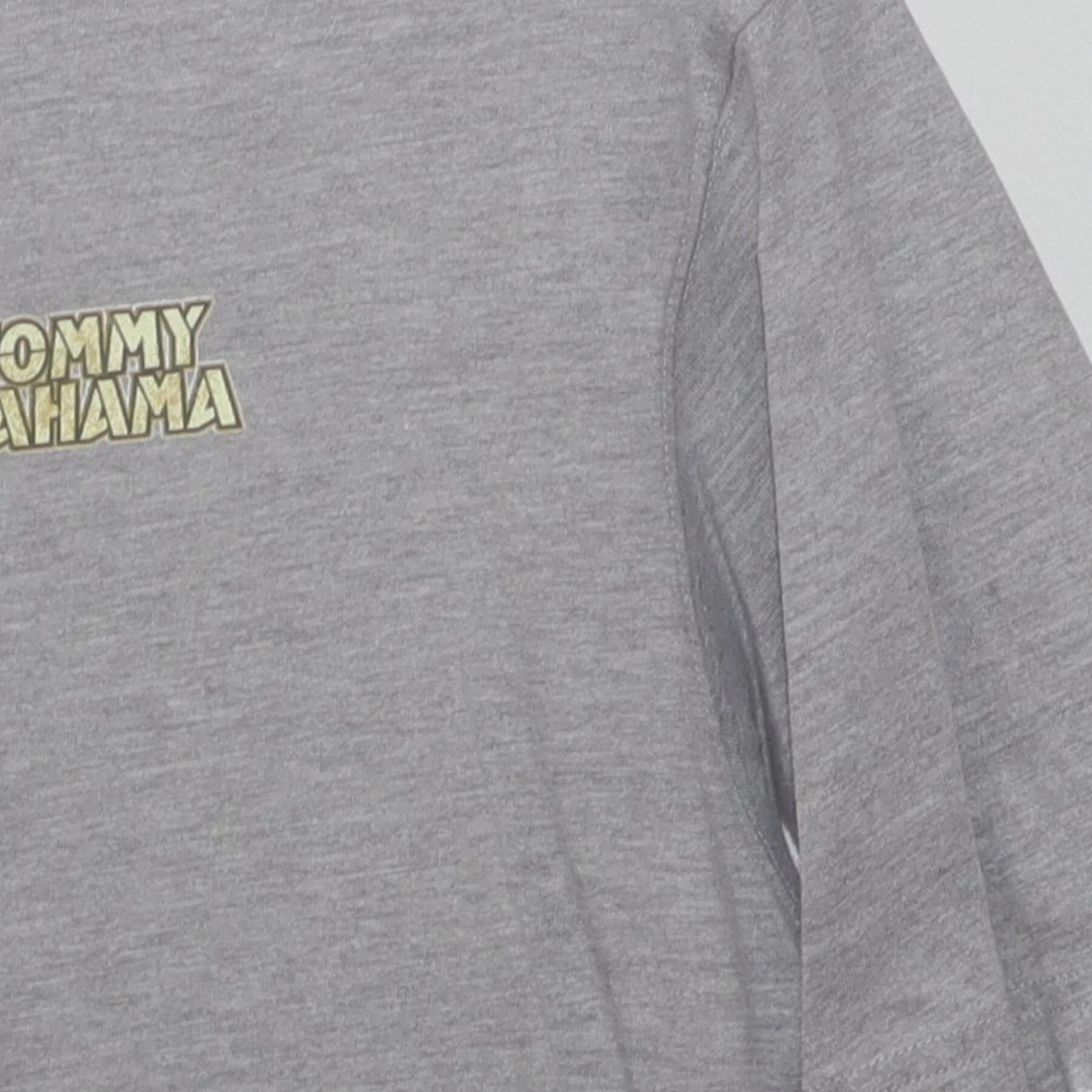 Close-up of the Right sleeve on the Vintage Y2K Tommy Bahama "Grill Sergeant" T-Shirt - L