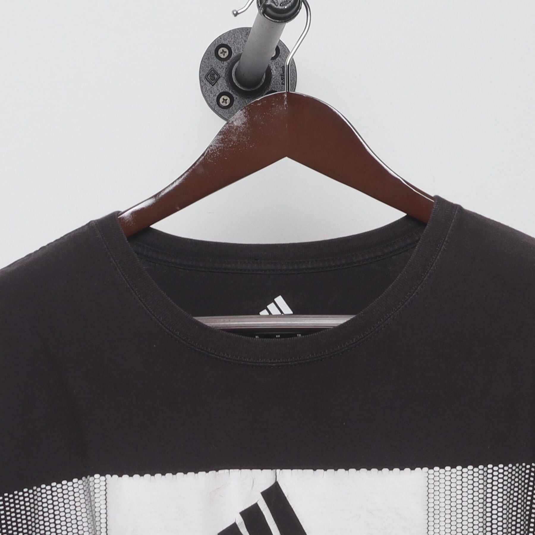 Close-up of the collar and tag on the Vintage Y2K Adidas "Pixelated Bar Logo" T-Shirt - L