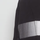 Close-up of the Left sleeve on the Vintage Y2K Adidas "Pixelated Bar Logo" T-Shirt - L