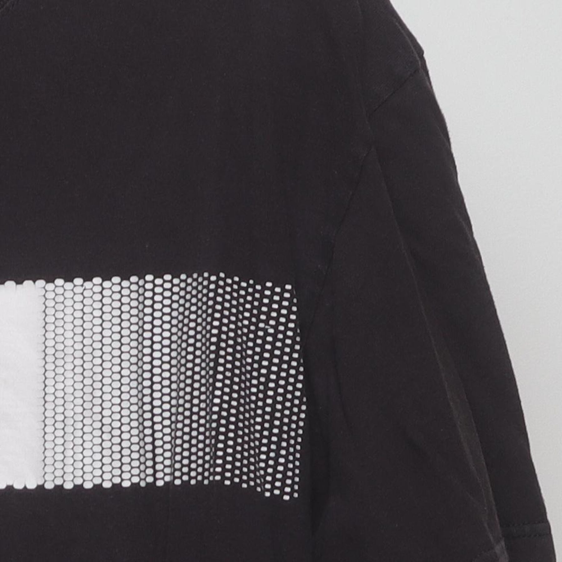 Close-up of the Right sleeve on the Vintage Y2K Adidas "Pixelated Bar Logo" T-Shirt - L