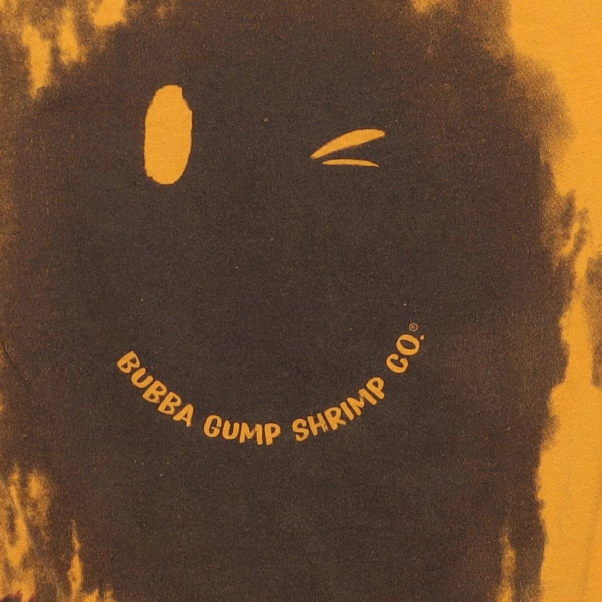 Close-up of the main graphic on the Vintage Y2K Bubba Gump Shrimp Co. "Winking Smiley" T-Shirt - XS