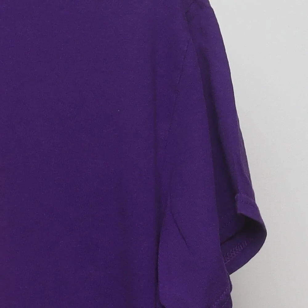 Close-up of the sleeve on the Vintage Y2K McDonald's "Rainbow Fries" T-Shirt - M