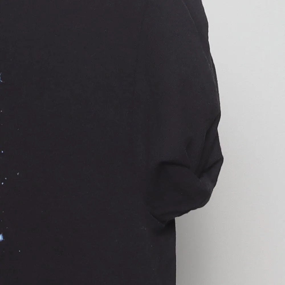 Close-up of the sleeve on the Vintage Y2K Michael Jackson "Moonwalker" T-Shirt - M