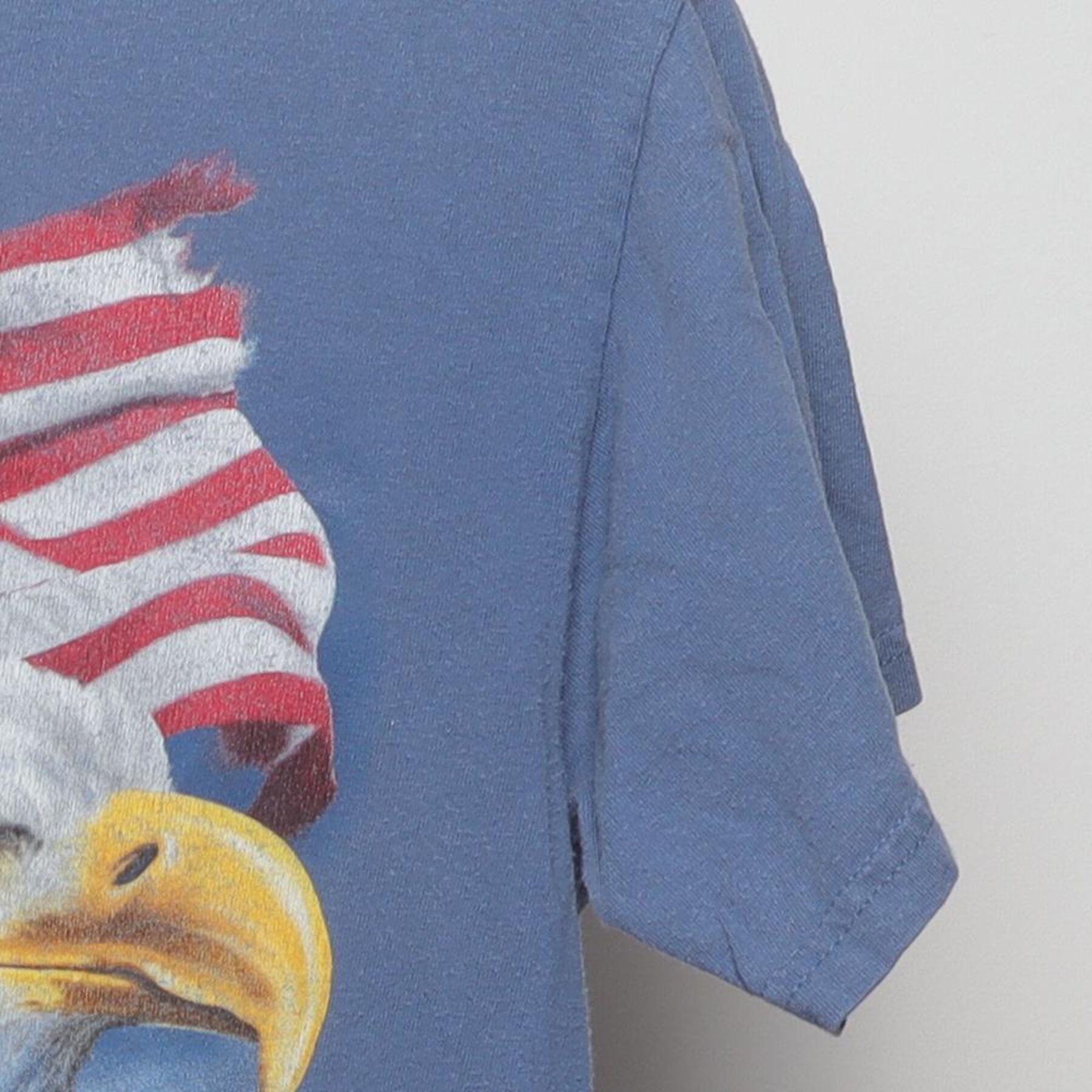 Close-up of the Right sleeve on the Vintage Y2K Freedom "The American Way" T-Shirt - S