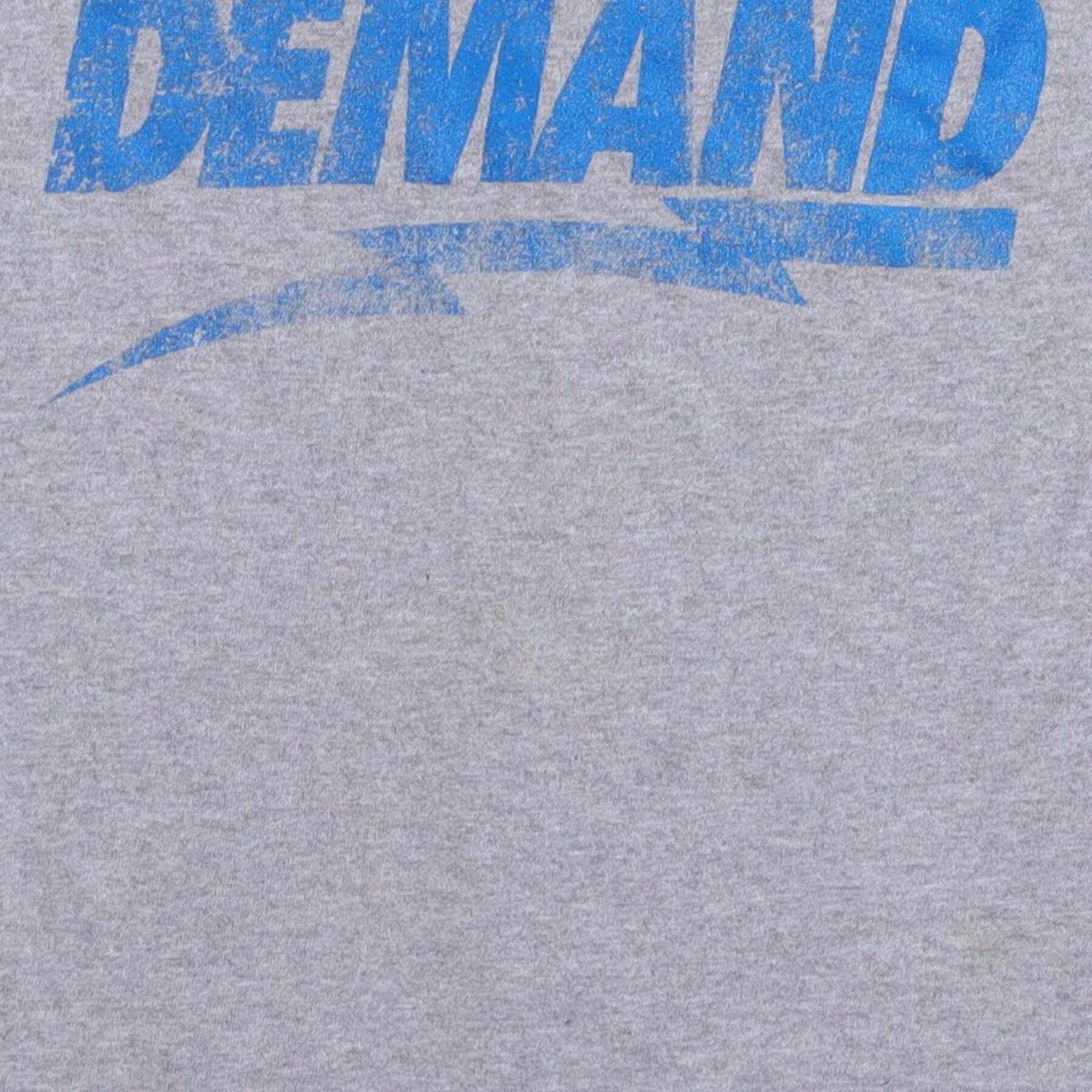 Close-up of the main graphic on the Vintage Y2K Popular Demand "Popular Demand" T-Shirt - XS
