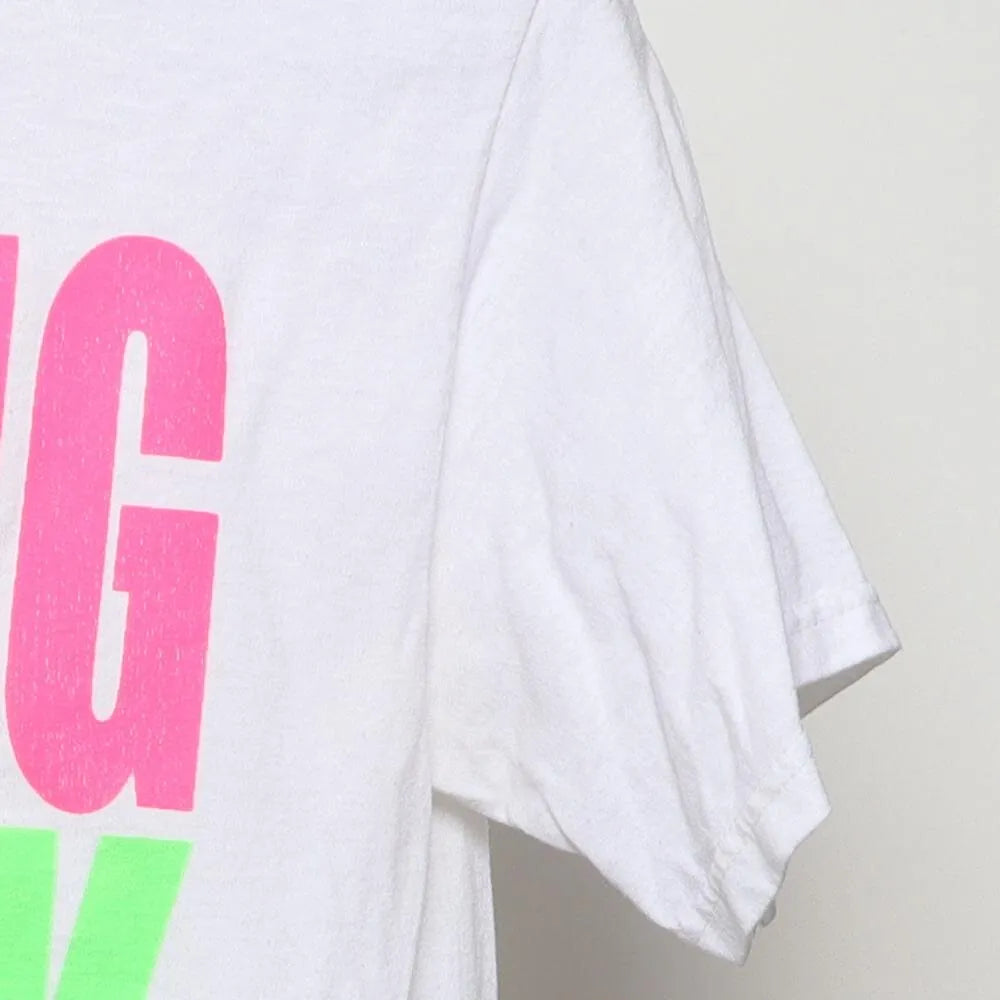 Close-up of the sleeve on the Vintage Y2K Spring Break "2008 Neon" T-Shirt - XS
