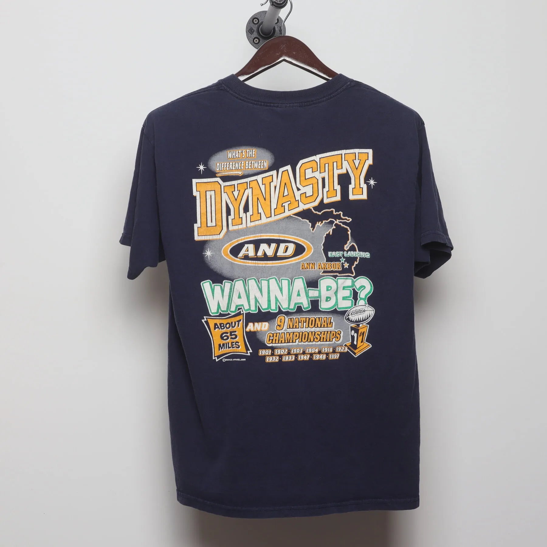 Back view of Vintage Y2K University of Michigan "Dynasty vs Wanna-Be" T-Shirt - L
