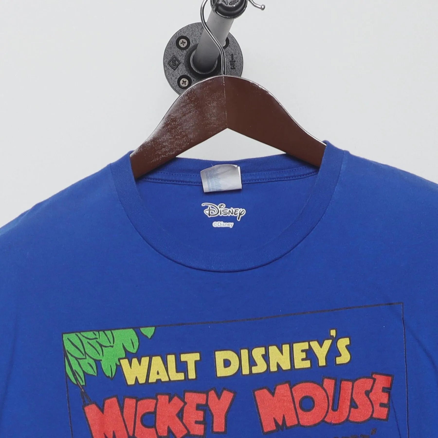 Close-up of the collar and tag on the Vintage 2000s Disney "Mickey Mouse The Band Concert" T-Shirt - L