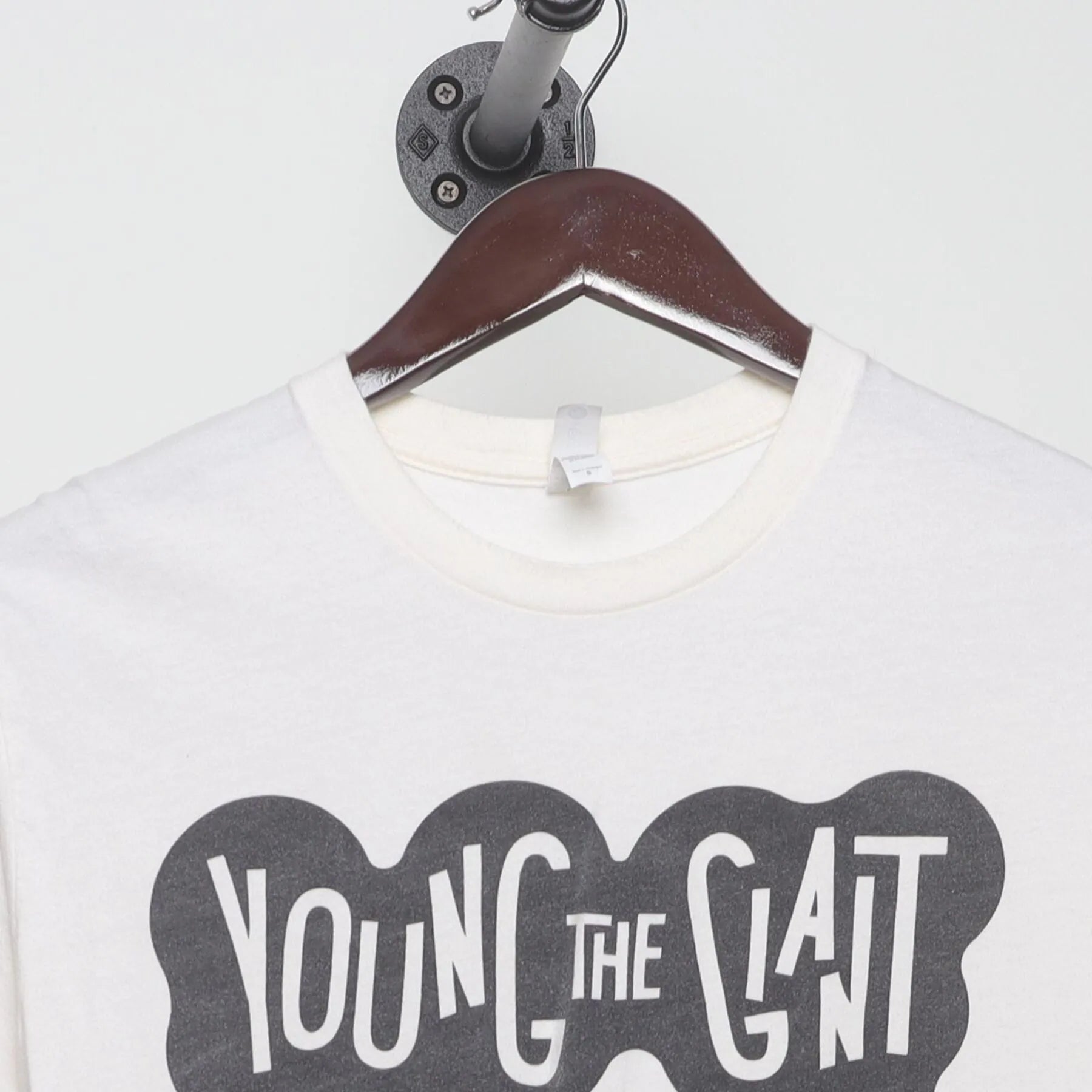 Close-up of the collar and tag on the Vintage 2010s Young the Giant "Lounging Smoker" T-Shirt - XS