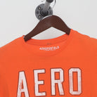Close-up of the collar and tag on the Vintage Y2K Aéropostale "AERO NYC-ATH 1987" T-Shirt - M