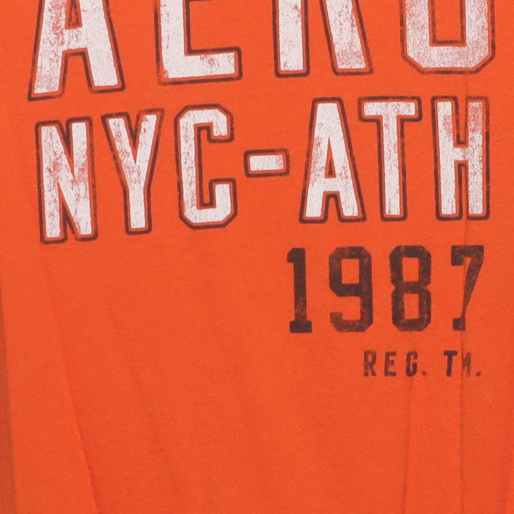 Close-up of the main graphic on the Vintage Y2K Aéropostale "AERO NYC-ATH 1987" T-Shirt - M
