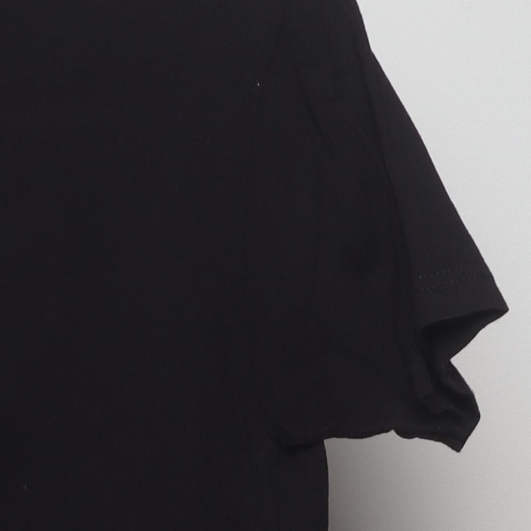 Close-up of the Right sleeve on the Vintage Y2K 1800 Coconut Tequila "Tequila Skull" T-Shirt - S