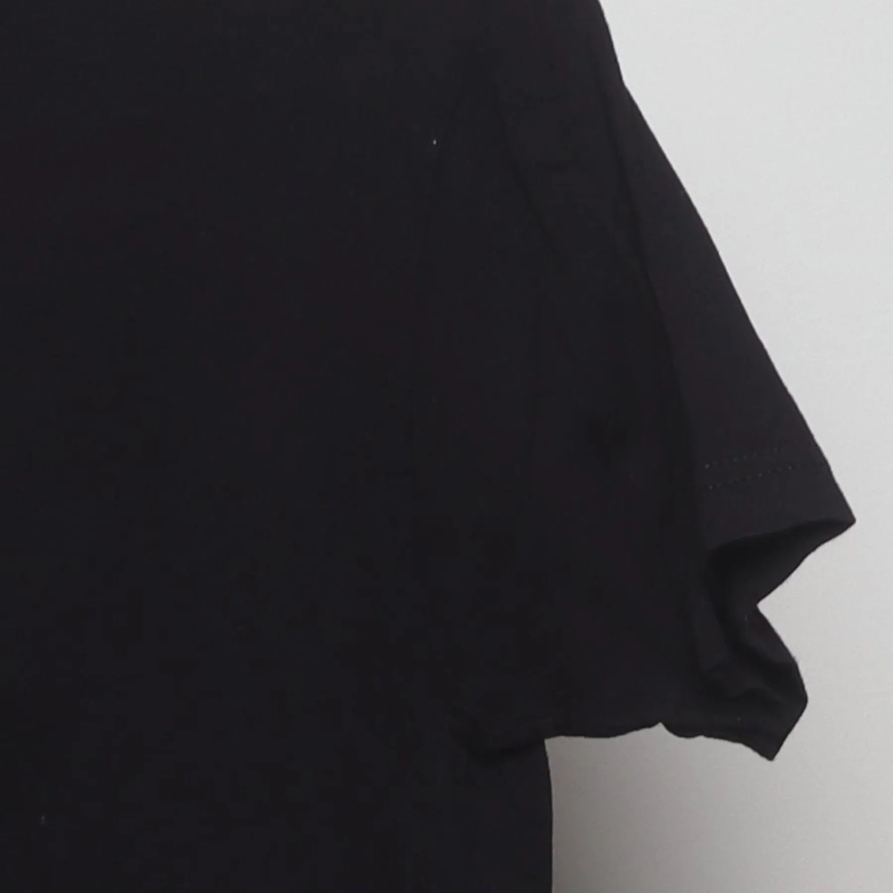 Close-up of the Right sleeve on the Vintage Y2K 1800 Coconut Tequila "Tequila Skull" T-Shirt - S