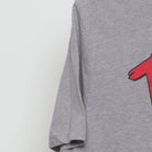 Close-up of the Left sleeve on the Vintage Y2K MAD "Rad White & Blue Lincoln" T-Shirt - L