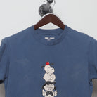Close-up of the collar and tag on the 2010s Uniqlo Peanuts Ice Cream Graphic Tee S