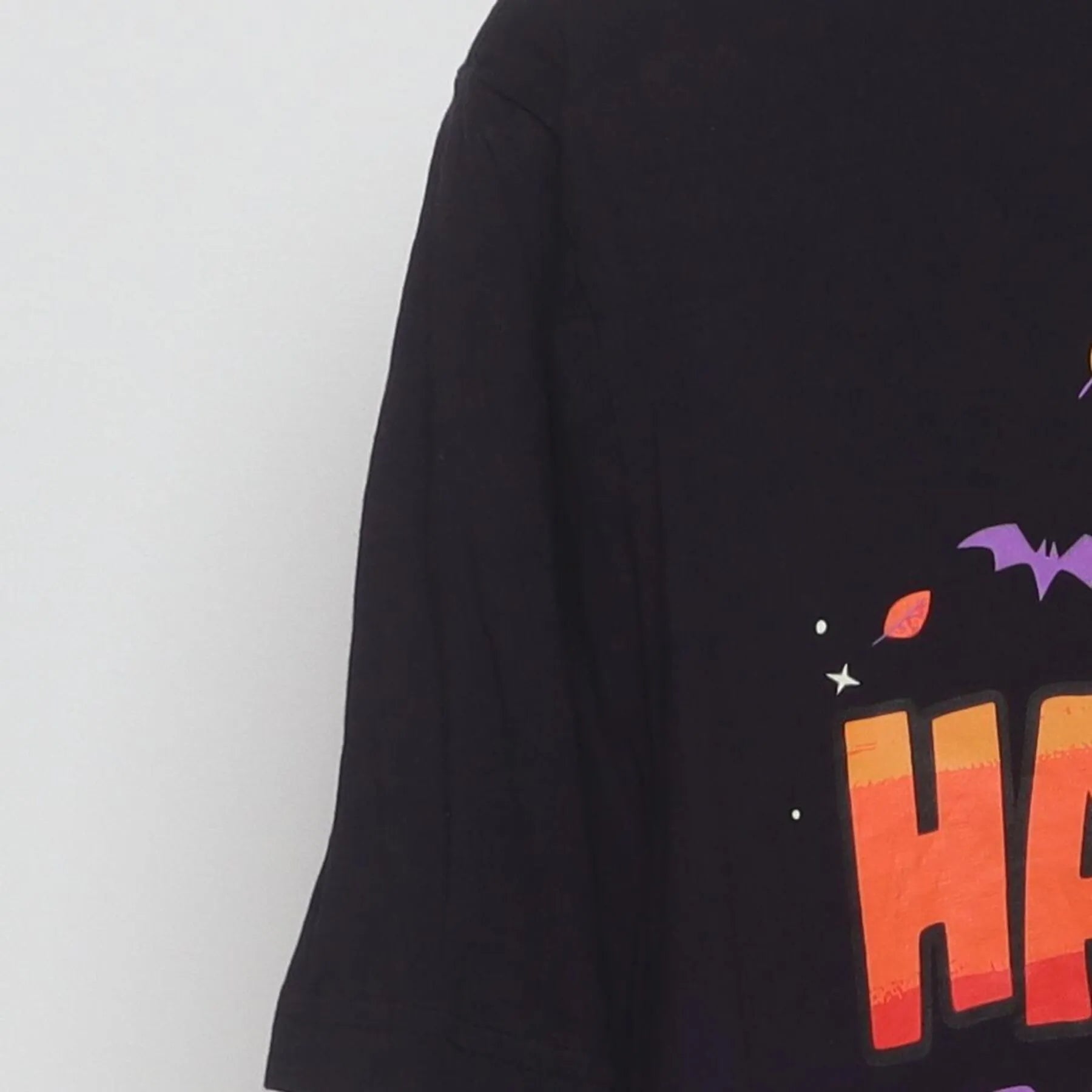 Close-up of the Left sleeve on the Vintage 2020s Disney "Happy Halloween 2021" T-Shirt - L