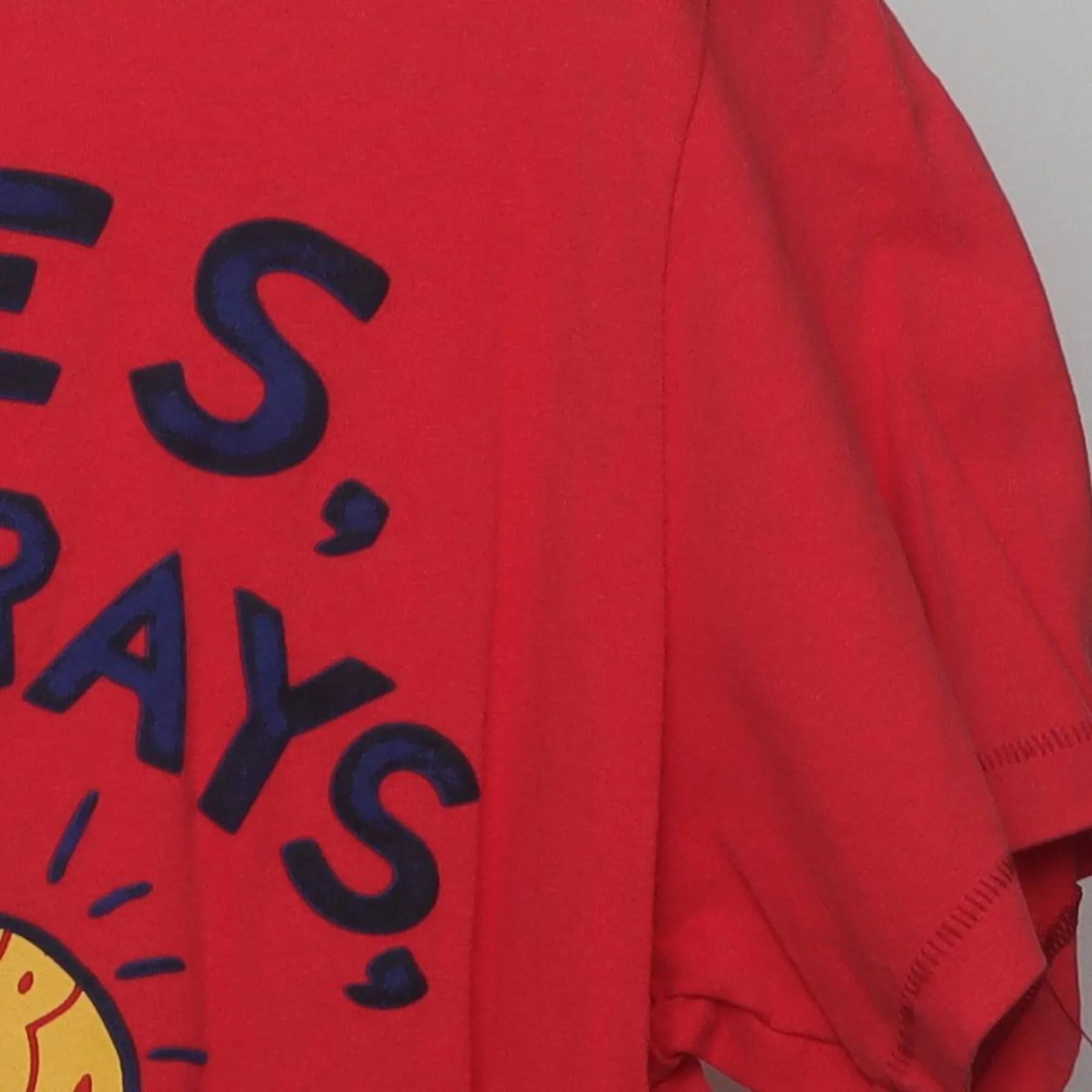 Right sleeve detail of Vintage Y2K Aéropostale "Waves, Rays, and Cali Days" Surfer Graphic T-Shirt
