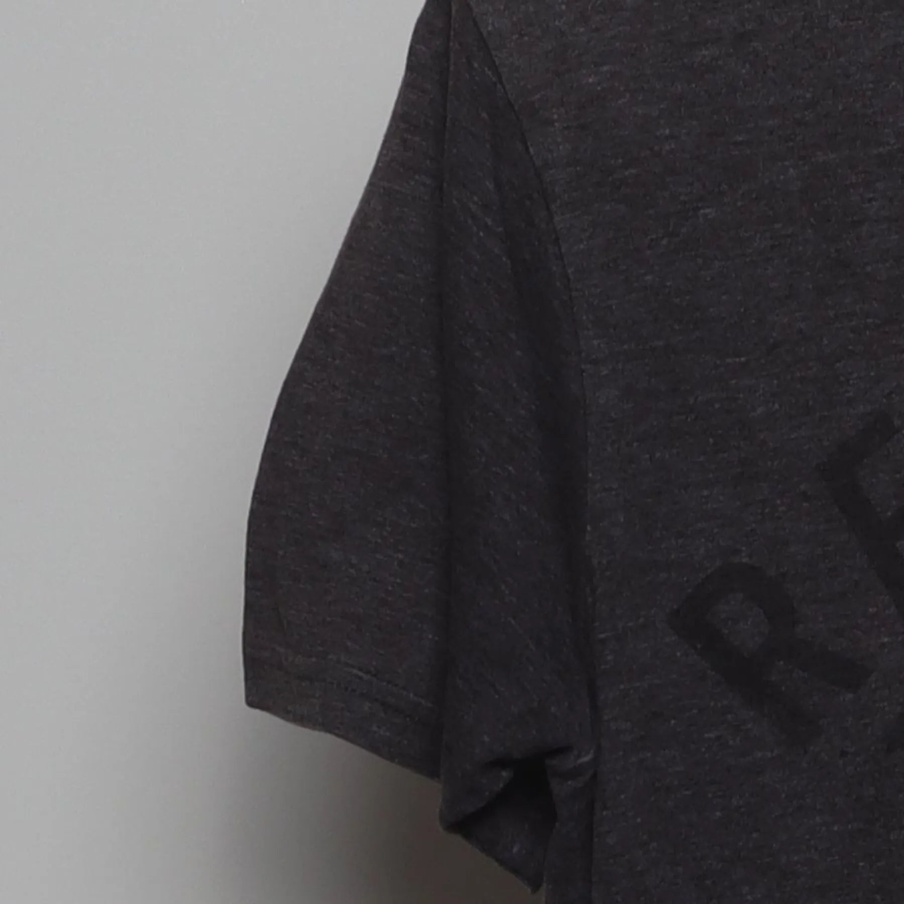 Left sleeve detail of Recovery Day T-Shirt | Modern Minimalist Graphic Tee | Charcoal Gray