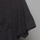 Right sleeve detail of Recovery Day T-Shirt | Modern Minimalist Graphic Tee | Charcoal Gray