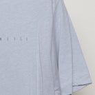 Right sleeve detail of Vintage O'Neill Surf Co. Palm Tree Beach Graphic T-Shirt