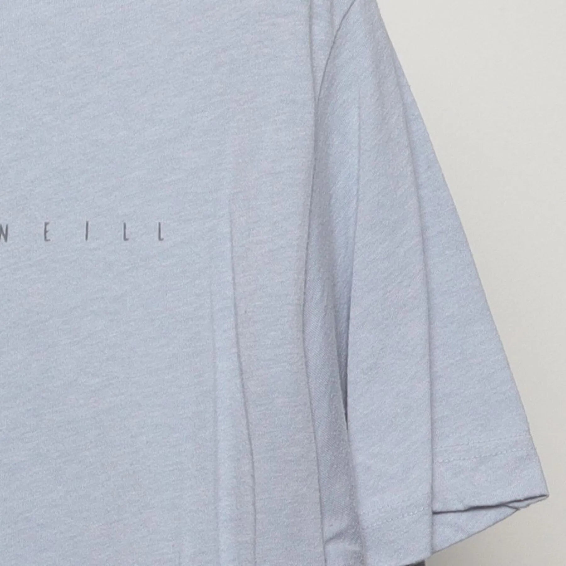Right sleeve detail of Vintage O'Neill Surf Co. Palm Tree Beach Graphic T-Shirt