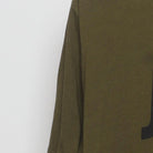 Left sleeve detail of Nike 'Just Do It' Glitch Graphic Dri-Fit T-Shirt Olive Green