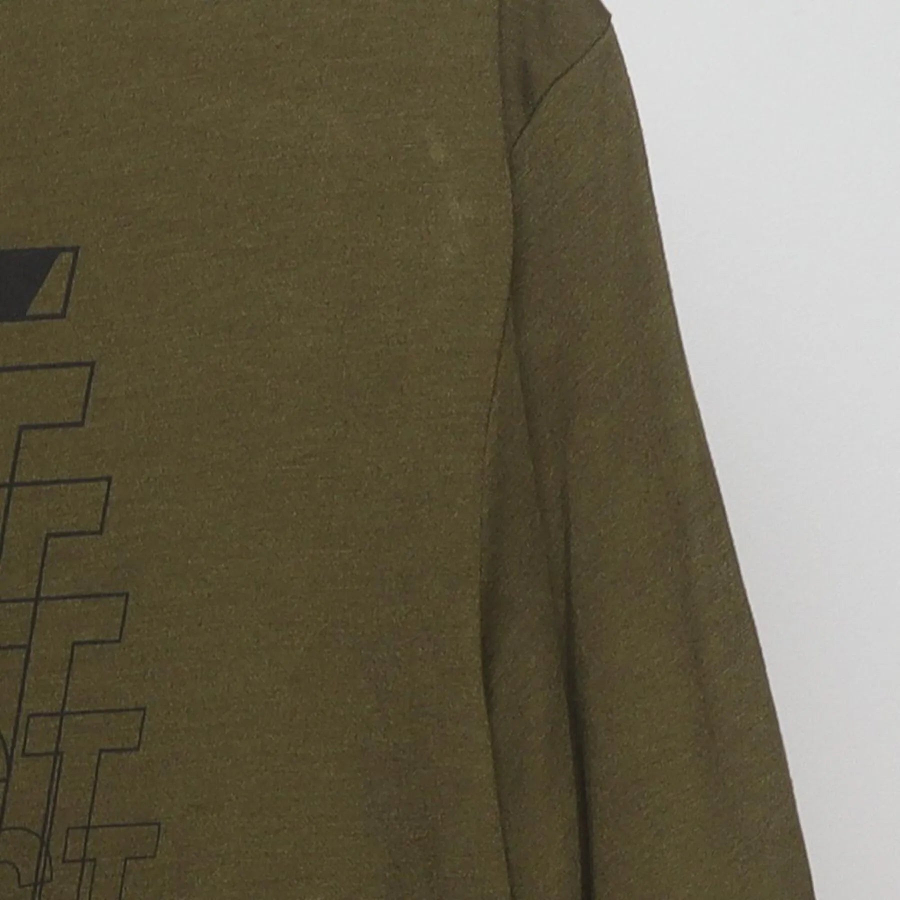Right sleeve detail of Nike 'Just Do It' Glitch Graphic Dri-Fit T-Shirt Olive Green