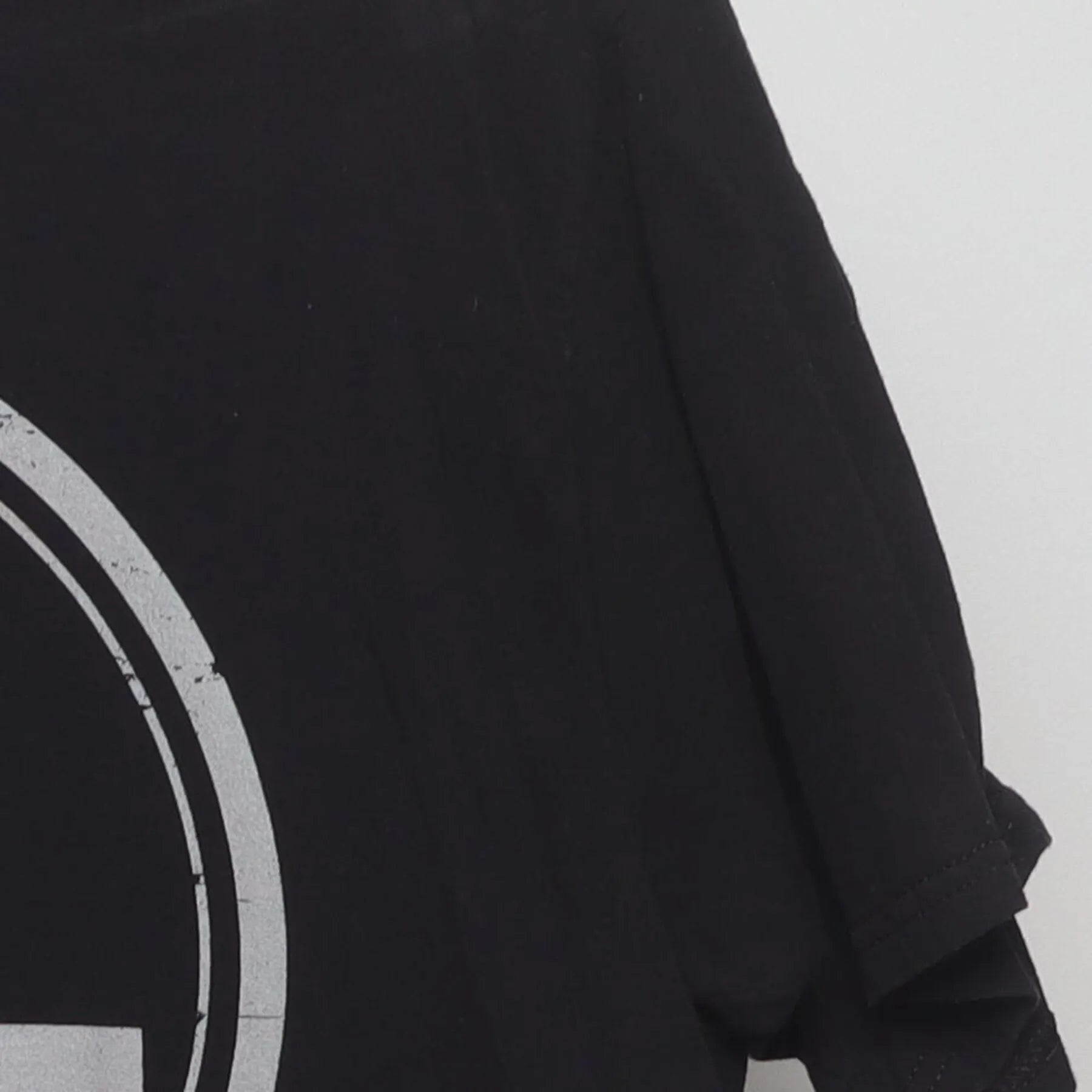 Right sleeve detail of Vintage "Stay Grounded" Electrical Symbol Graphic T-Shirt