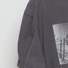 Left sleeve detail of Vintage Modern Universal Studios "Photo Collage Graphic" T-Shirt - XL