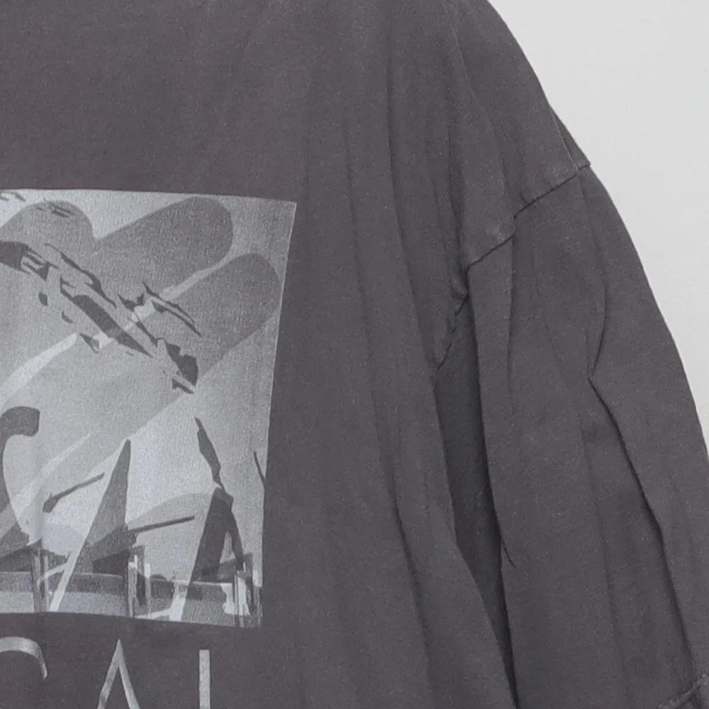 Right sleeve detail of Vintage Modern Universal Studios "Photo Collage Graphic" T-Shirt - XL