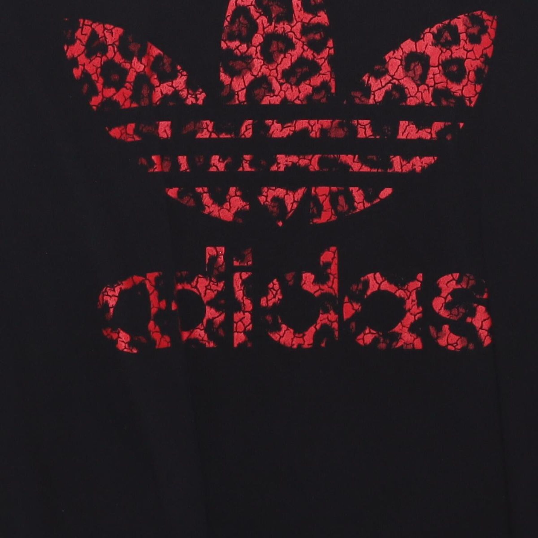 Close-up of the main graphic on the Vintage Y2K Adidas "Red Leopard Trefoil Logo" T-Shirt - XL