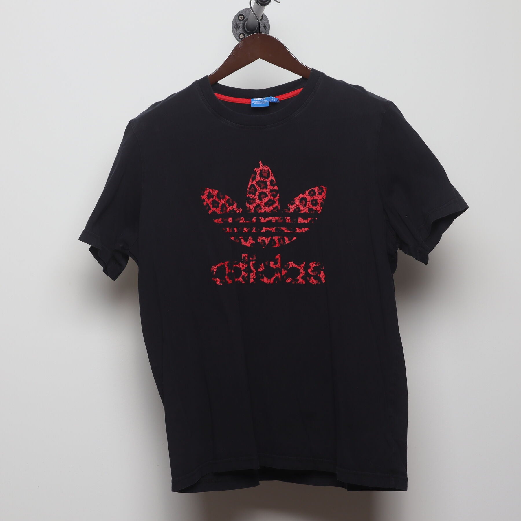 Front view of Vintage Y2K Adidas "Red Leopard Trefoil Logo" T-Shirt - XL