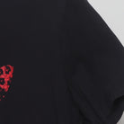 Close-up of the Right sleeve on the Vintage Y2K Adidas "Red Leopard Trefoil Logo" T-Shirt - XL