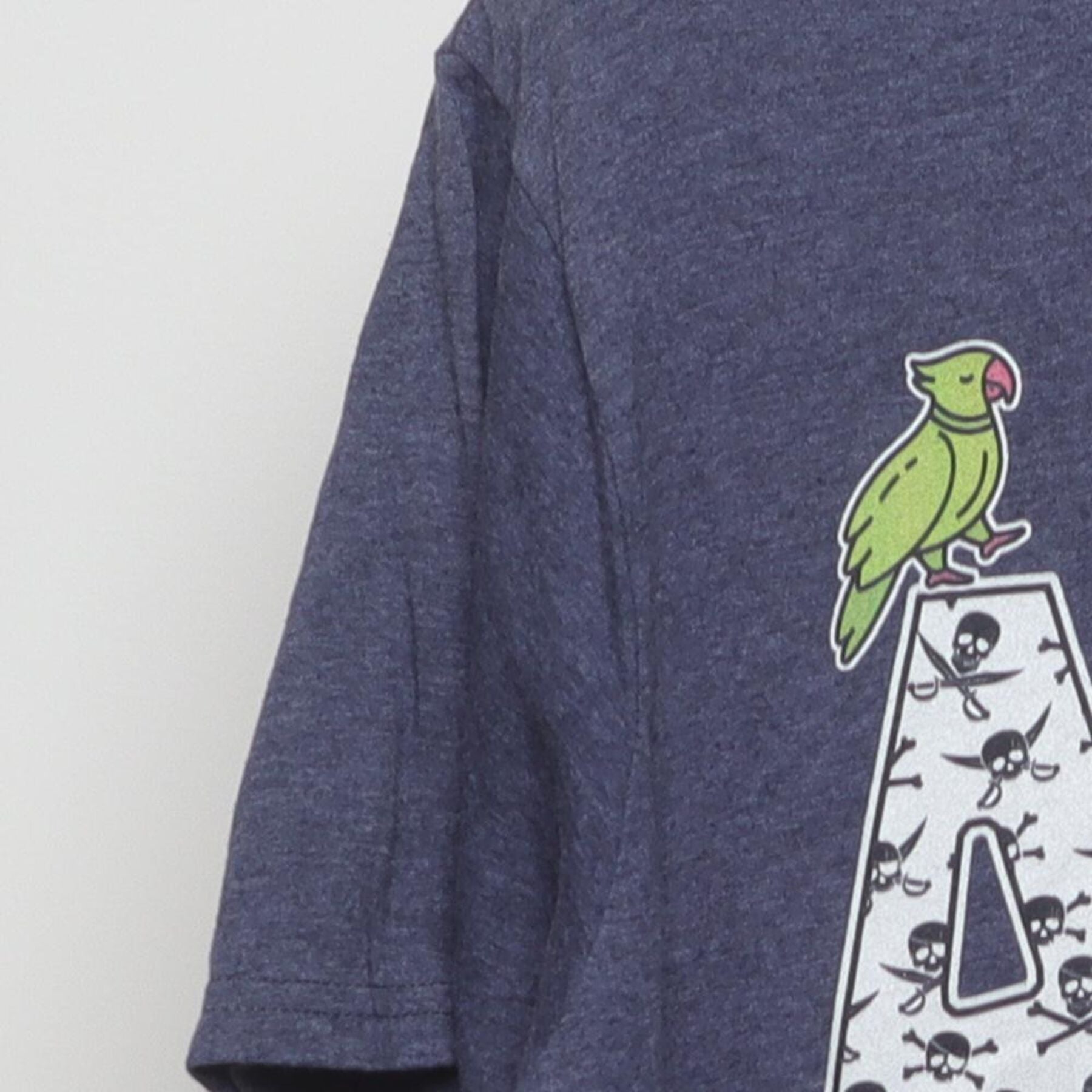 Close-up of the Left sleeve on the Vintage 2010s Pirate Graphic "ARRGH" T-Shirt - M