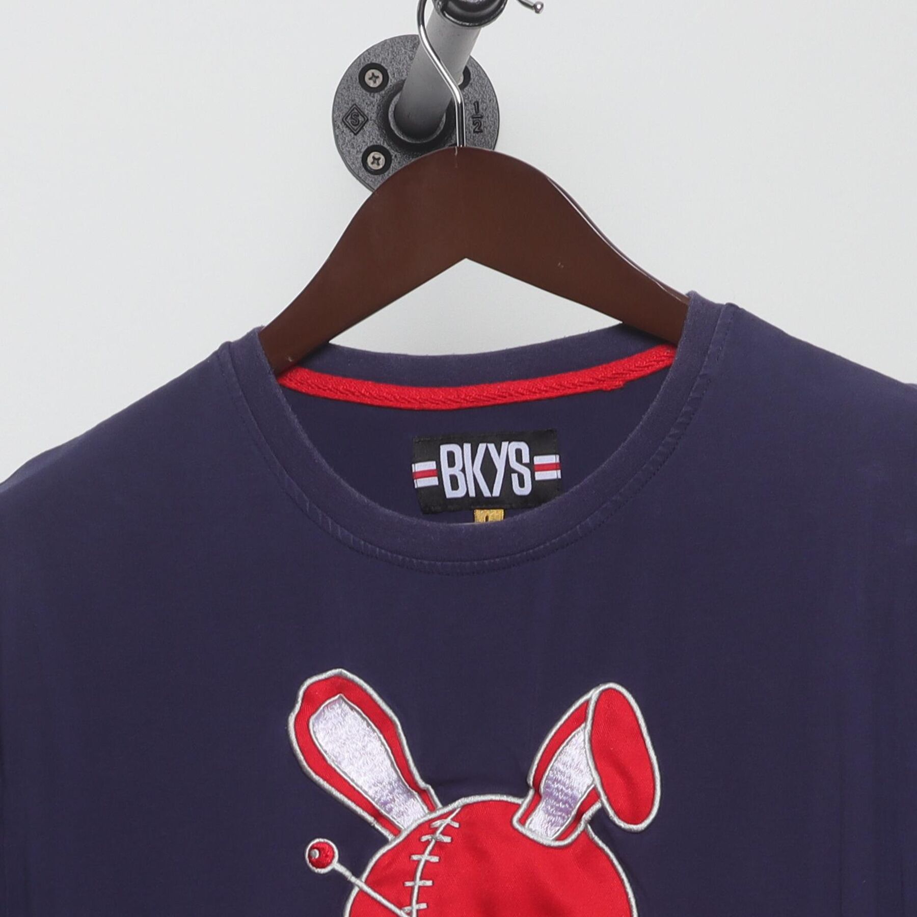 Close-up of the collar and tag on the Vintage Y2K BKYS "Lucky Charm Bunny" T-Shirt - M