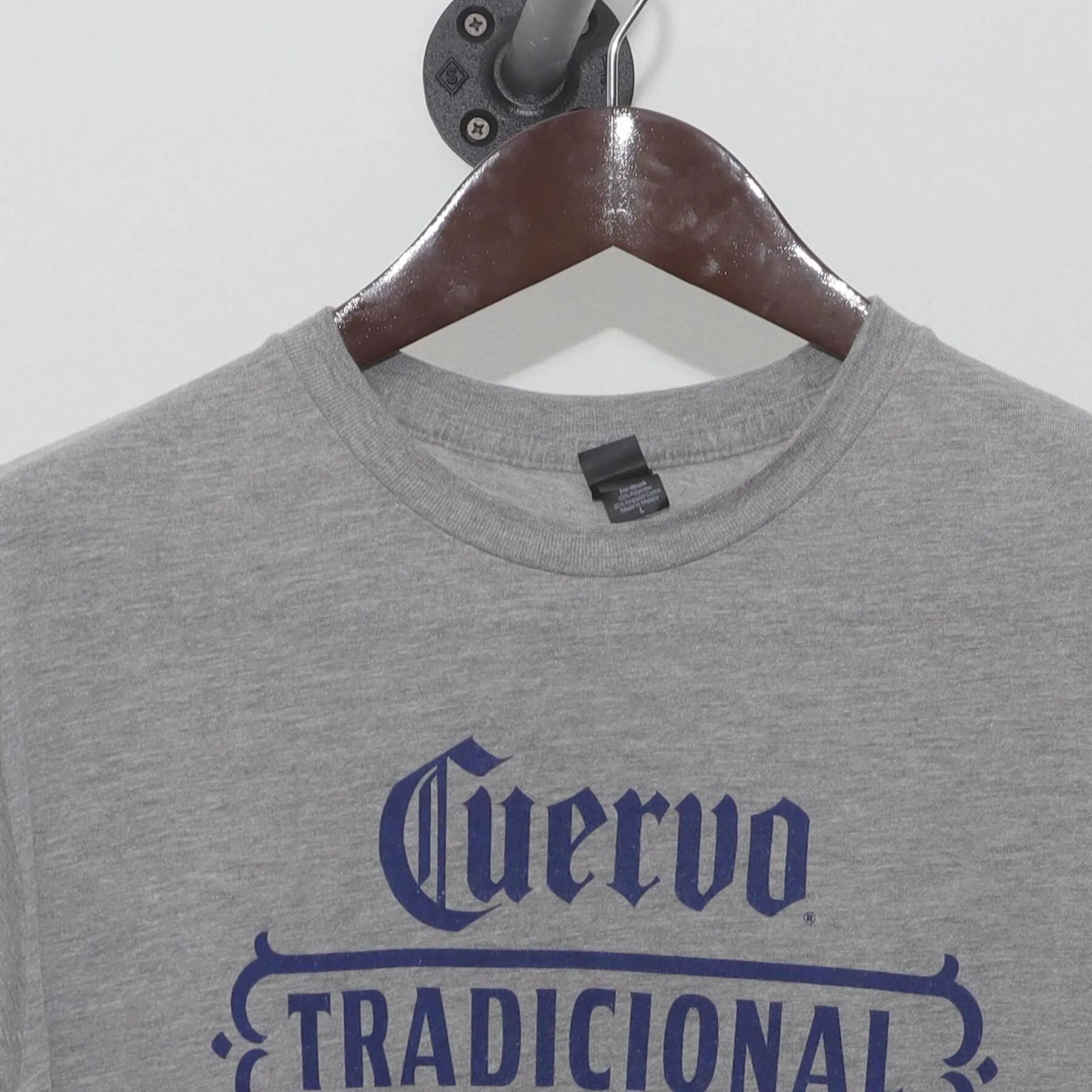 Close-up of the collar and tag on the Vintage 2010s Cuervo "Tradicional" T-Shirt - M